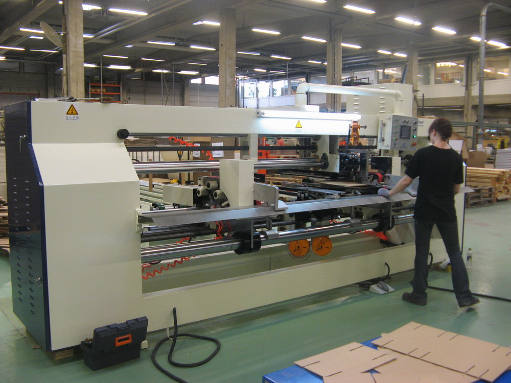 Computer-Controlled Two-Pieces Semi-Auto Stitcher